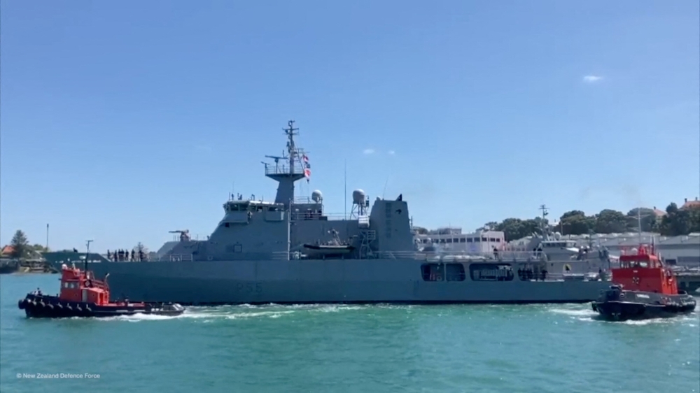 HMNZS Wellington departs with naval divers, hydrographers and a helicopter on board to assist with delivering supplies to Tonga after a volcanic eruption and tsunami, from Devonport Naval Base in Auckland, New Zealand January 18, 2022 according to a statement by New Zealand Defence Force. Courtesy of NZDF/Handout via REUTERS