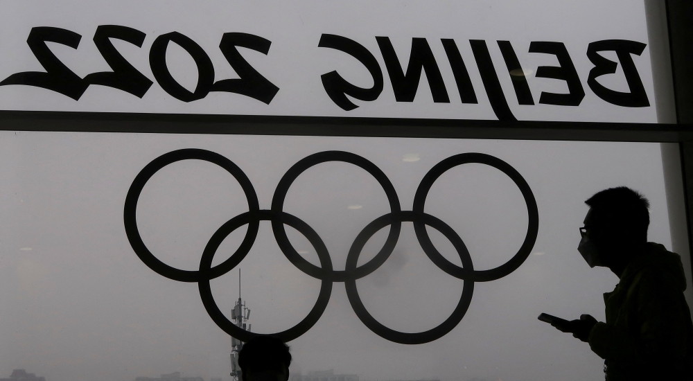 A person looks on at the Main Press Centre ahead of the Beijing 2022 Winter Olympics in Beijing, China, January 24, 2022. REUTERS/Fabrizio Bensch