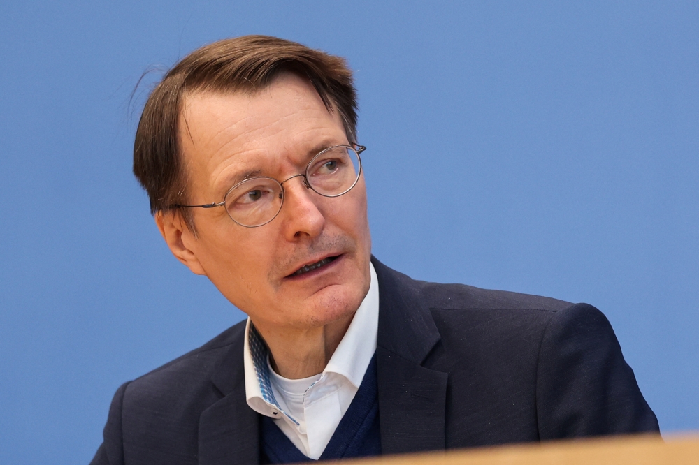 German Health Minister Karl Lauterbach speaks as he attends a news conference on the coronavirus disease (COVID-19) pandemic in Berlin, Germany, January 28, 2022. REUTERS/Christian Mang/Pool