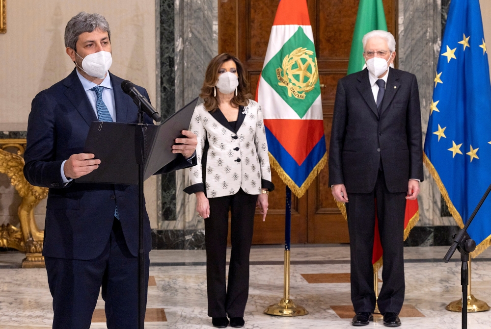 Italian Chamber of Deputies President Roberto Fico speaks next to Senate President Maria Elisabetta Alberti Casellati and Italian President Sergio Mattarella, after Mattarella was re-elected. Italian Presidency/Paolo Giandotti/Handout via Reuters