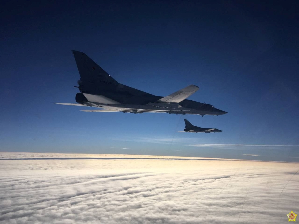 A view shows two Russian long-range strategic bombers Tu-22M3 during joint military exercises with Belarusian Air Forces in Belarusian air space, in this handout photo released February 5, 2022. Belarusian Defence Ministry