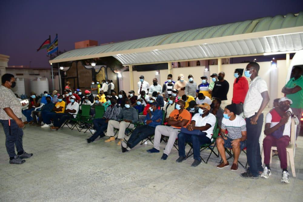 Kenyans in Qatar participate in voters registration at the embassy premises in Doha, yesterday.