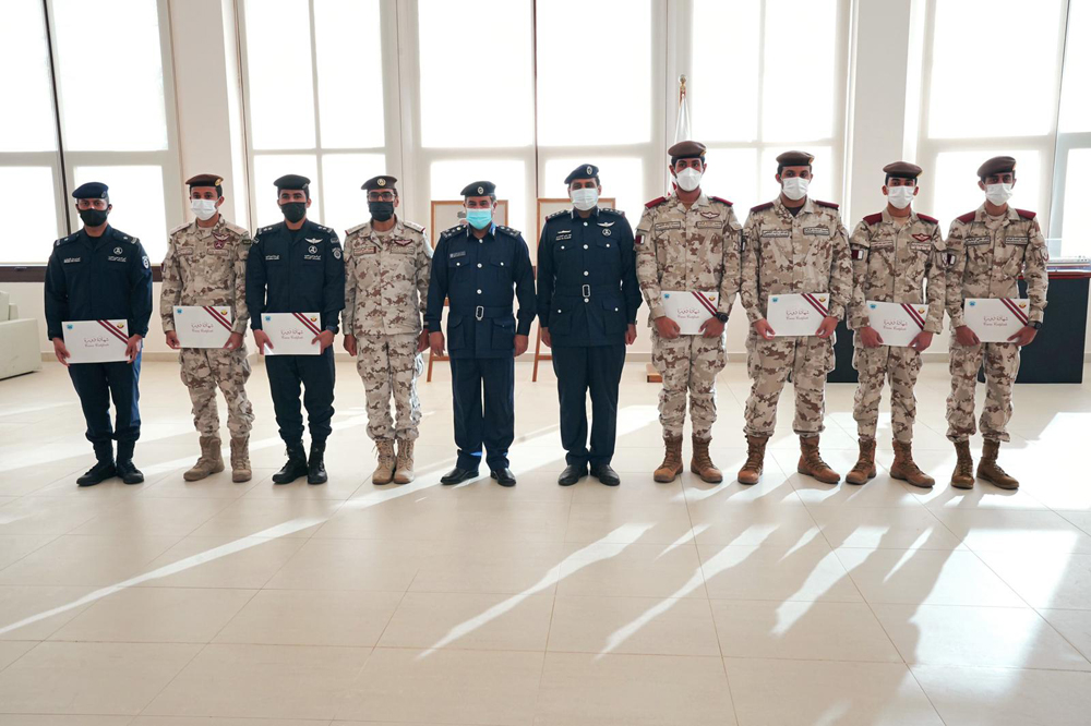 Officials with participants of the course.