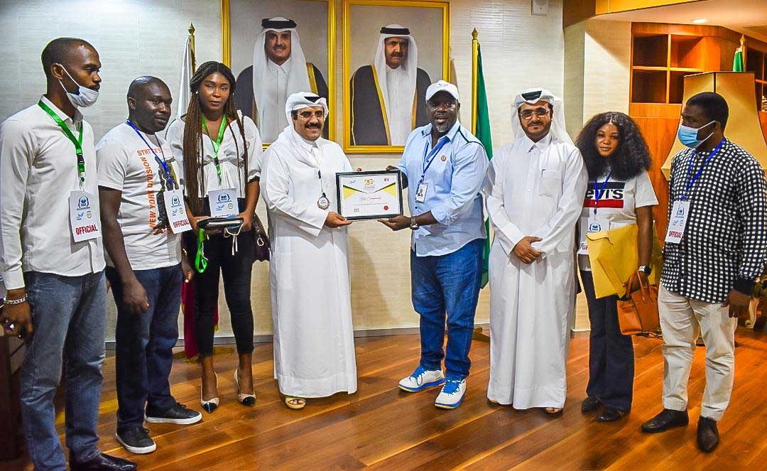 Ambassador of Qatar to Nigeria H E Dr. Ali bin Ghanem Al Hajri receiving the honorary certificate.