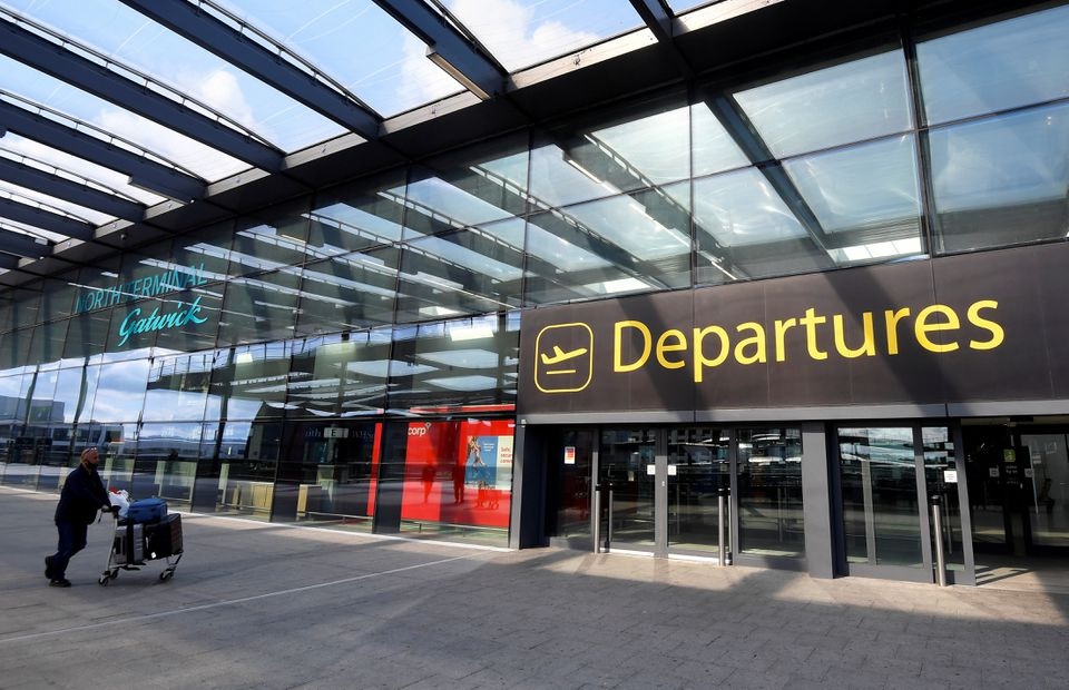A passenger arrives at Gatwick Airport, as travel restrictions are eased following the coronavirus disease (COVID-19) outbreak, in Gatwick, Britain July 10, 2020. REUTERS/Toby Melville