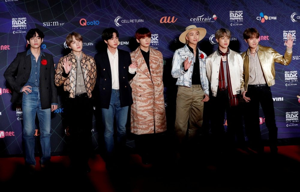 Members of South Korean boy band BTS pose on the red carpet during the annual MAMA Awards at Nagoya Dome in Nagoya, Japan, December 4, 2019. REUTERS/Kim Kyung-Hoon/File Photo