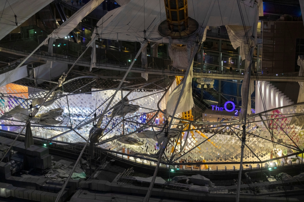 The white-domed roof of the O2 arena is seen damaged by the wind, as a red weather warning was issued due to Storm Eunice, in London, Britain, February 18, 2022. Reuters/May James