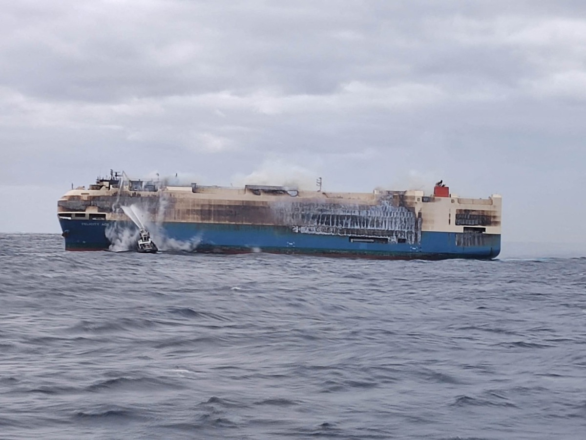 FILE PHOTO: The ship, Felicity Ace, which was traveling from Emden, Germany, where Volkswagen has a factory, to Davisville, in the U.S. state of Rhode Island, burns more than 100 km from the Azores islands, Portugal, February 18, 2022. Portuguese Navy (Marinha Portuguesa)/Handout via REUTERS