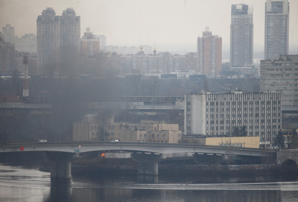 Smoke rises from the territory of the Ukrainian Defence Ministry's unit, after Russian President Vladimir Putin authorized a military operation in eastern Ukraine, in Kyiv, Ukraine February 24, 2022. Reuters/Valentyn Ogirenko