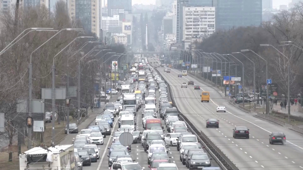 Heavy traffic is seen on a road heading out of the Ukrainian capital Kyiv, as Russian military operation begins, in Ukraine, February 24, 2022 in this screen grab taken from a live video.