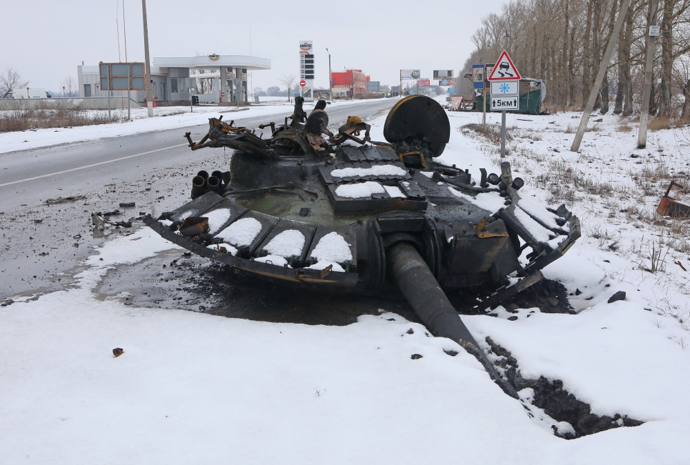 The turret of a destroyed tank is seen on the roadside in Kharkiv, Ukraine February 26, 2022. Reuters/Vyacheslav Madiyevskyy