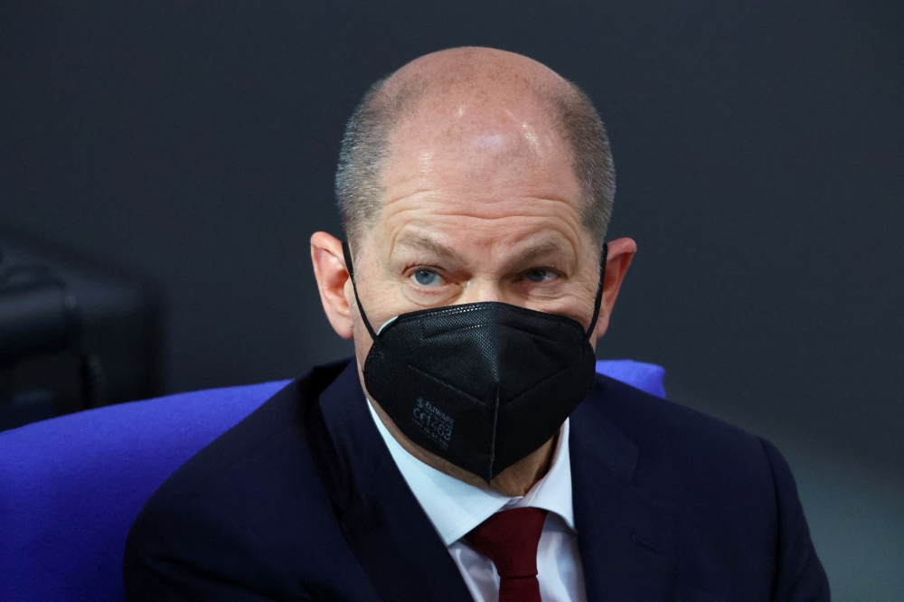 German Chancellor Olaf Scholz attends an extraordinary session, after Russia launched a massive military operation against Ukraine, at the lower house of parliament Bundestag in Berlin, Germany, February 27, 2022. Reuters/Fabrizio Bensch