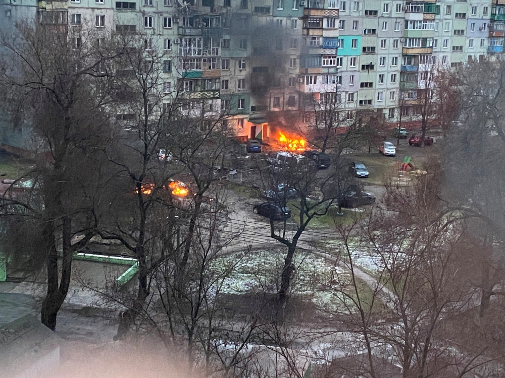 Fire is seen in Mariupol at a residential area after shelling amid Russia's invasion of Ukraine March 3, 2022, in this image obtained from social media. Twitter @AyBurlachenko via REUTERS