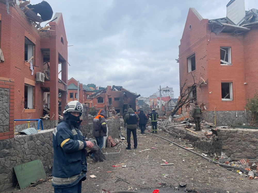 Police and State Emergency Service (SES) officers work at the scene where several houses have been damaged by an explosion, following an air strike in Bila Tserkva, Kyiv Oblast, Ukraine March 5, 2022 in this picture obtained from social media. Kyiv Oblast Police
