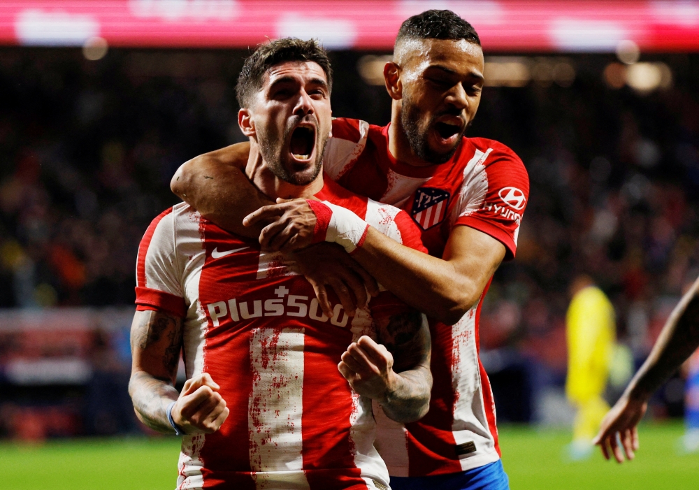Atletico Madrid's Rodrigo De Paul celebrates scoring their second goal with Renan Lodi REUTERS/Susana Vera