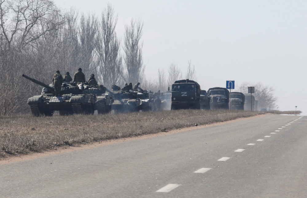A view shows a convoy of pro-Russian troops during Ukraine-Russia conflict outside the separatist-controlled town of Volnovakha in the Donetsk region, Ukraine March 12, 2022. REUTERS