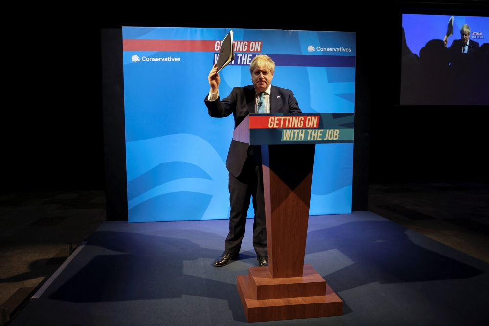 British Prime Minister Boris Johnson gestures at the Conservative Party Spring Conference in Blackpool, Britain March 19, 2022. (REUTERS/Phil Noble)