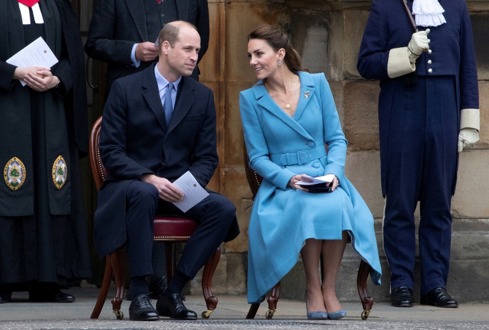 Britain's Prince William and Catherine, Duchess of Cambridge attend a Beating of the Retreat at Holyroodhouse Palace in Edinburgh, Scotland, Britain May 27, 2021. (Jane Barlow/PA Wire/Pool via REUTERS/File Photo)