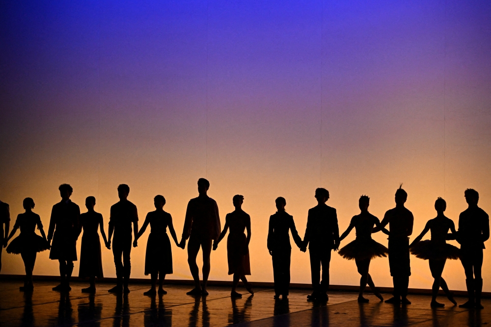 Ballet dancers acknowledge a standing ovation during 'Dance for Ukraine', a charity gala to raise funds for people in need in Ukraine, at The London Coliseum, in London, Britain, March 19, 2022. Picture taken March 19, 2022. REUTERS/Dylan Martinez