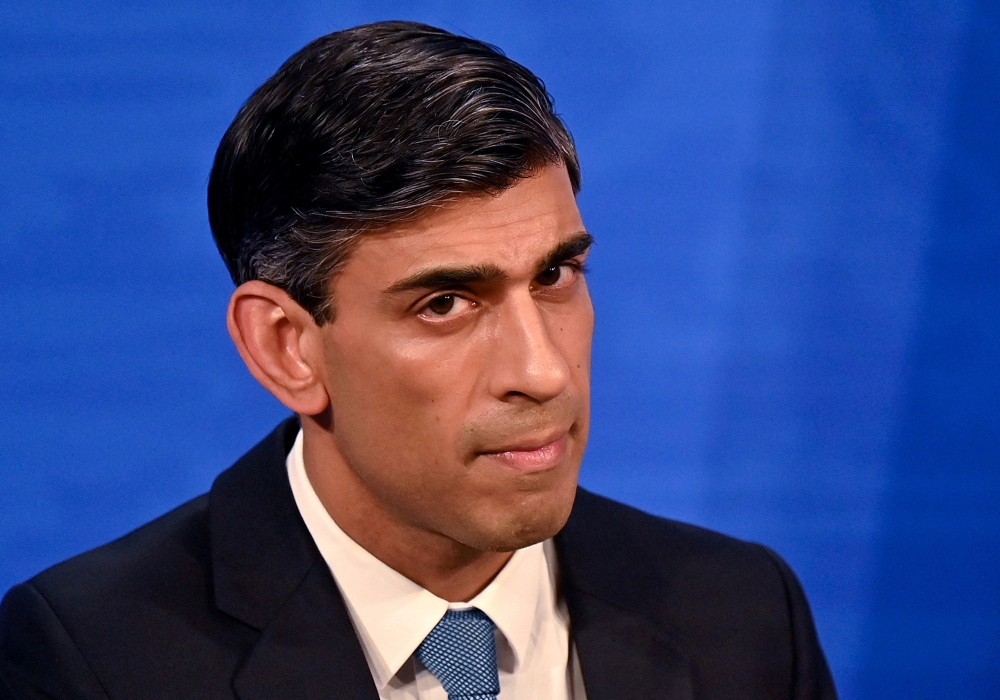 Britain's Chancellor of the Exchequer Rishi Sunak hosts a news conference in the Downing Street Briefing Room in London, Britain February 3, 2022. Justin Tallis/Pool via REUTERS/File Photo