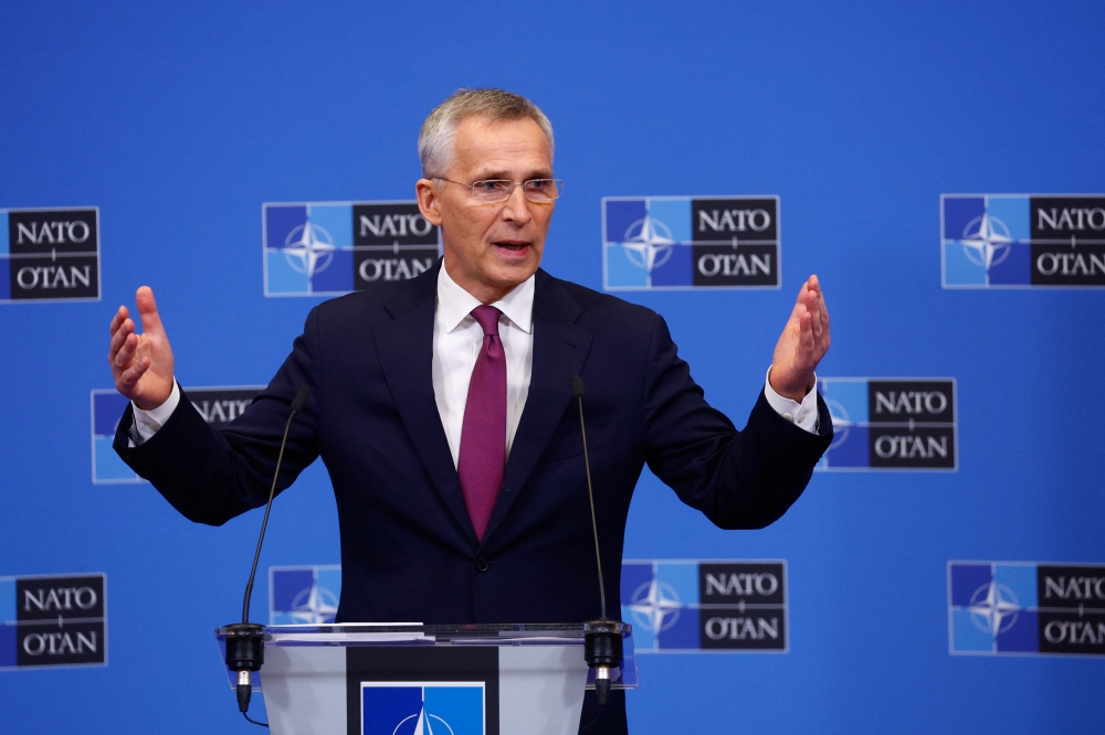 NATO Secretary General Jens Stoltenberg gestures during a news conference on the eve of a NATO summit, amid Russia's invasion of Ukraine, in Brussels, Belgium March 23, 2022. REUTERS/Gonzalo Fuentes