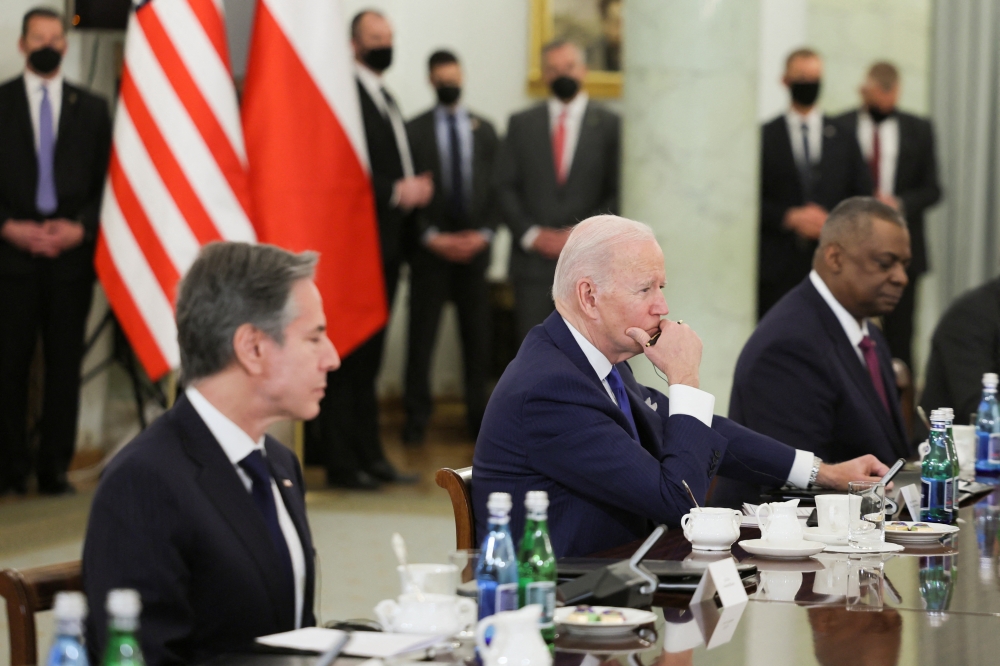 U.S. Secretary of State Antony Blinken, U.S. President Joe Biden and U.S. Secretary of Defense Lloyd Austin attend a bilateral meeting with the Polish Delegation, including Polish President Andrzej Duda (not pictured), amid Russia's invasion of Ukraine, in the Column Hall at the Presidential Palace, in Warsaw, Poland March 26, 2022. REUTERS.