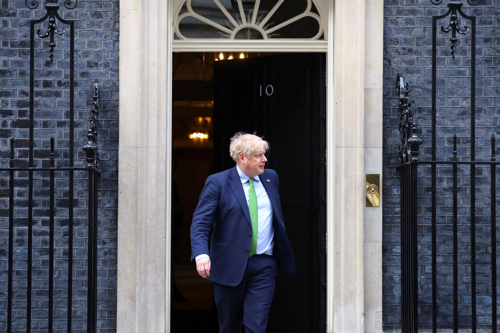 British Prime Minister Boris Johnson waits for Finnish President Sauli Niinisto outside Downing Street in London, Britain March 15, 2022. Reuters/Hannah McKay/File Photo