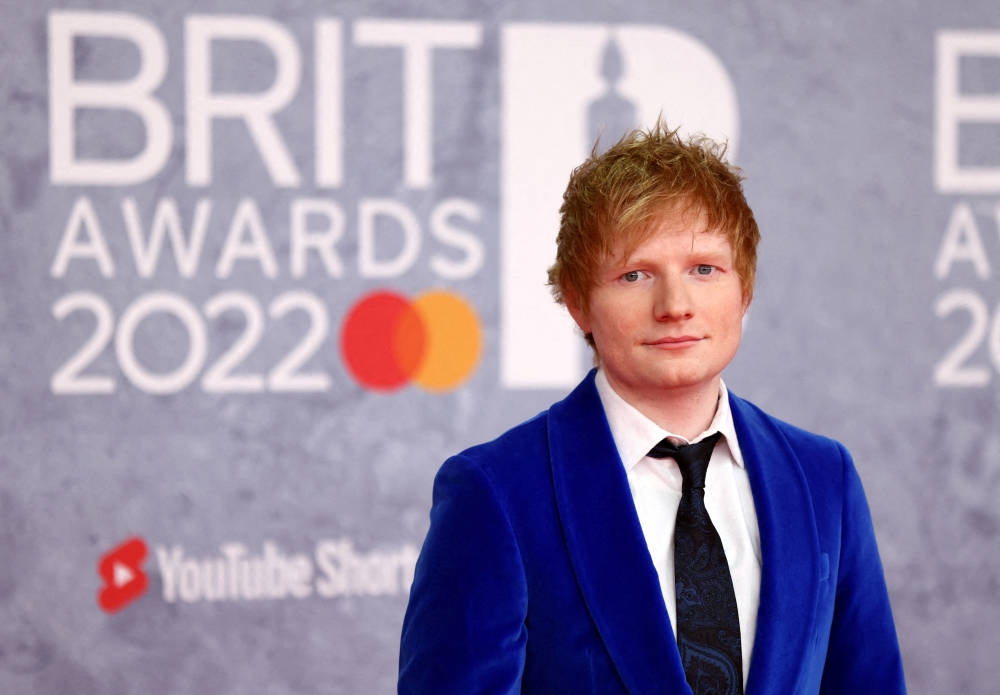 Ed Sheeran poses as he arrives for the Brit Awards at the O2 Arena in London, Britain, February 8, 2022 REUTERS/Tom Nicholson/File Photo