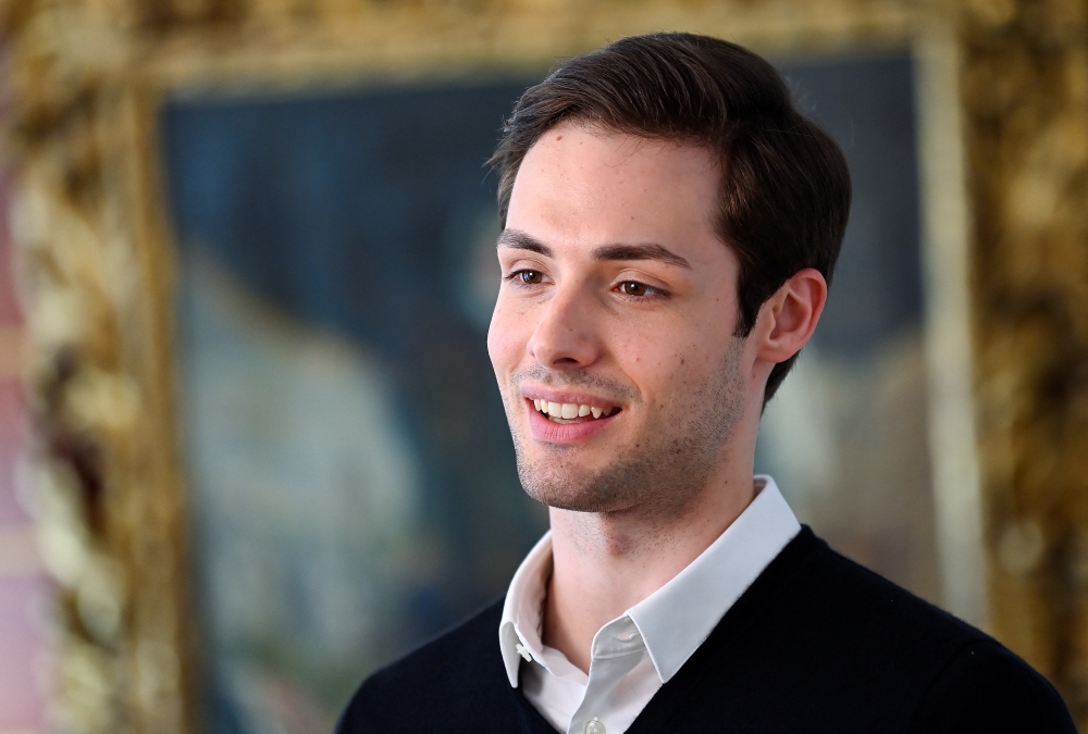 Italian ballet dancer Jacopo Tissi looks on before an interview at the Teatro alla Scala, after Russia's invasion of Ukraine prompted his departure from Moscow's Bolshoi Ballet, where he had been promoted to principal dancer, in Milan, Italy, April 5, 2022. Picture taken April 5, 2022. REUTERS/Flavio Lo Scalzo