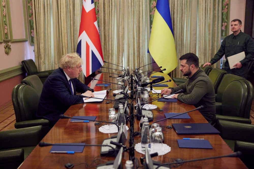 kraine's President Volodymyr Zelenskiy and British Prime Minister Boris Johnson attend a meeting, as Russia?s attack on Ukraine continues, in Kyiv, Ukraine April 9, 2022. (Ukrainian Presidential Press Service)