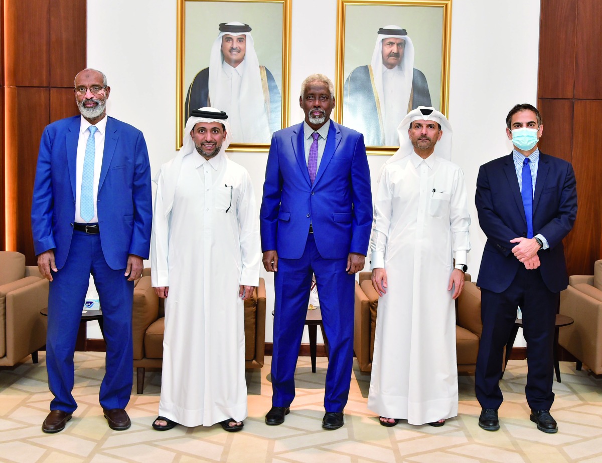QU President, Dr. Hassan Al Derham (second left); Chairman of the Board of Trustees of Mogadishu University, Dr. Abdurahman Moallim Abdullahi; and other officials on the occasion of signing the MoU. 