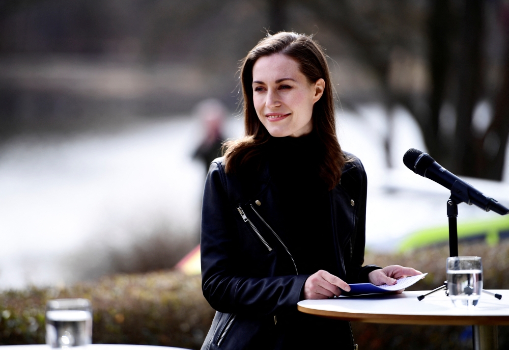 Finland's Prime Minister Sanna Marin reacts during a news conference with Sweden's Prime Minister Magdalena Andersson, in Stockholm, Sweden, April 13, 2022. Paul Wennerholm/TT News Agency/via Reuters