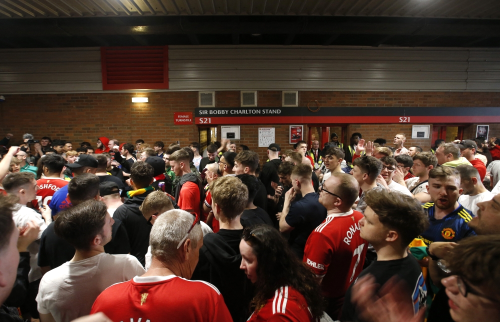 Manchester United fans protest against the Glazer family’s ownership of the club outside the stadium during the match (Reuters/Ed Sykes)