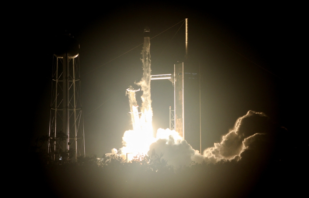 A SpaceX Falcon 9 rocket lifts off carrying four astronauts on a six-month expedition on the International Space Station, at Cape Canaveral, Florida, U.S. April 27, 2022. REUTERS/Thom Baur