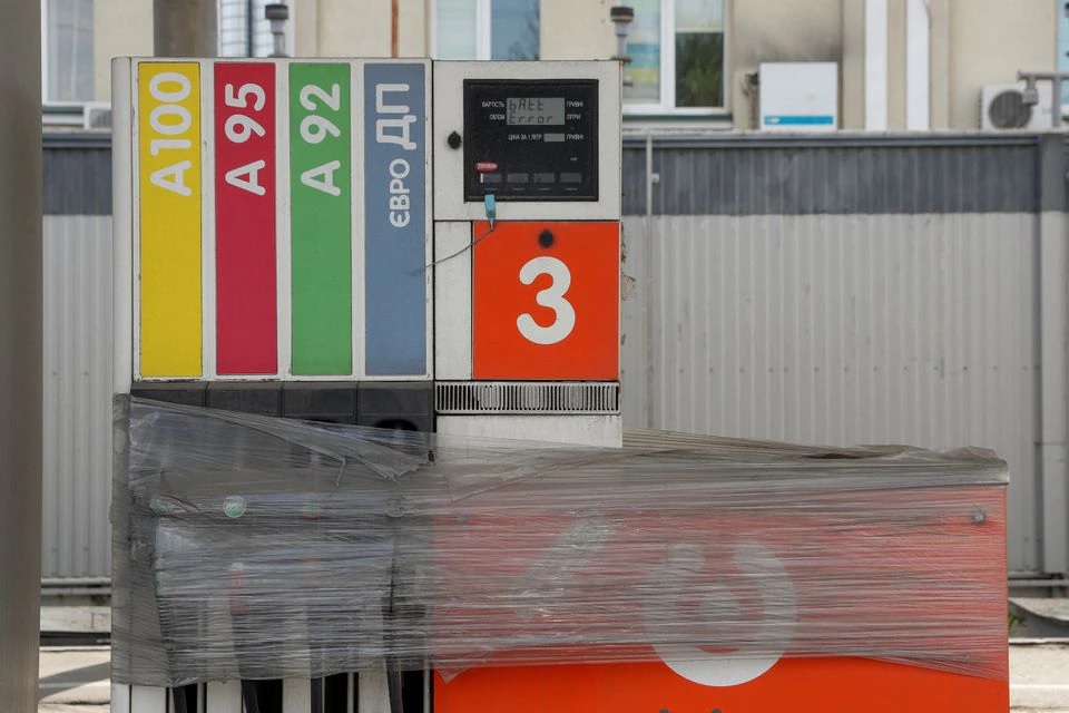 Fuel pumps wrapped with polythene are seen at a closed petrol station, as Russia's attack on Ukraine continues, in Kyiv, Ukraine May 2, 2022. REUTERS/Valentyn Ogirenko


