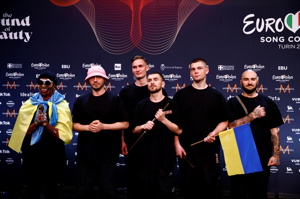 Kalush Orchestra from Ukraine pose for photographers after winning the 2022 Eurovision Song Contest, in Turin, Italy, May 15, 2022. Reuters/Yara Nardi