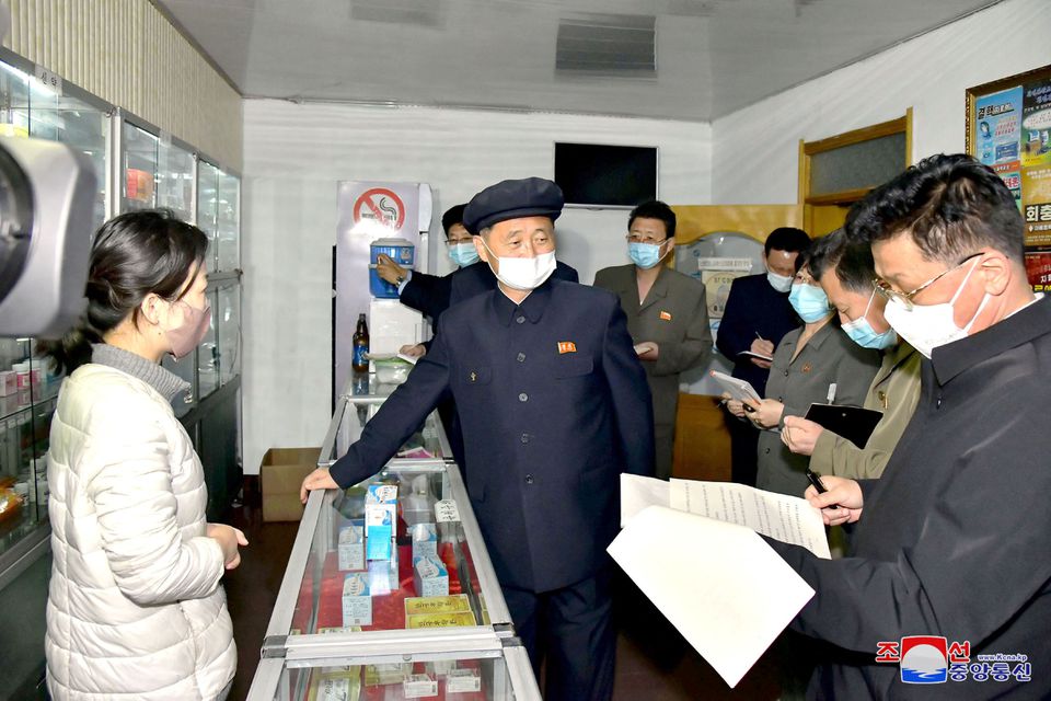 North Korea's Premier Kim Tok Hun, inspects a pharmacy amid the coronavirus disease (COVID-19) pandemic, in Pyongyang