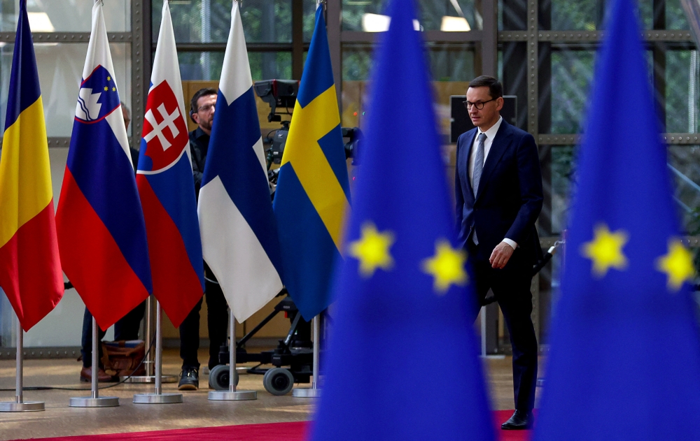 Polish Prime Minister Mateusz Morawiecki arrives for the second day of a European Union leaders summit in Brussels, Belgium May 31, 2022. Reuters/Johanna Geron
 