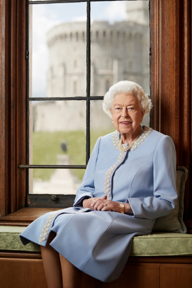 An undated handout photo issued by Buckingham Palace of the official Platinum Jubilee portrait of Britain's Queen Elizabeth II photographed at Windsor Castle and obtained by Reuters on June 1, 2022. Royal Household/Ranald Mackechnie/Handout via REUTERS