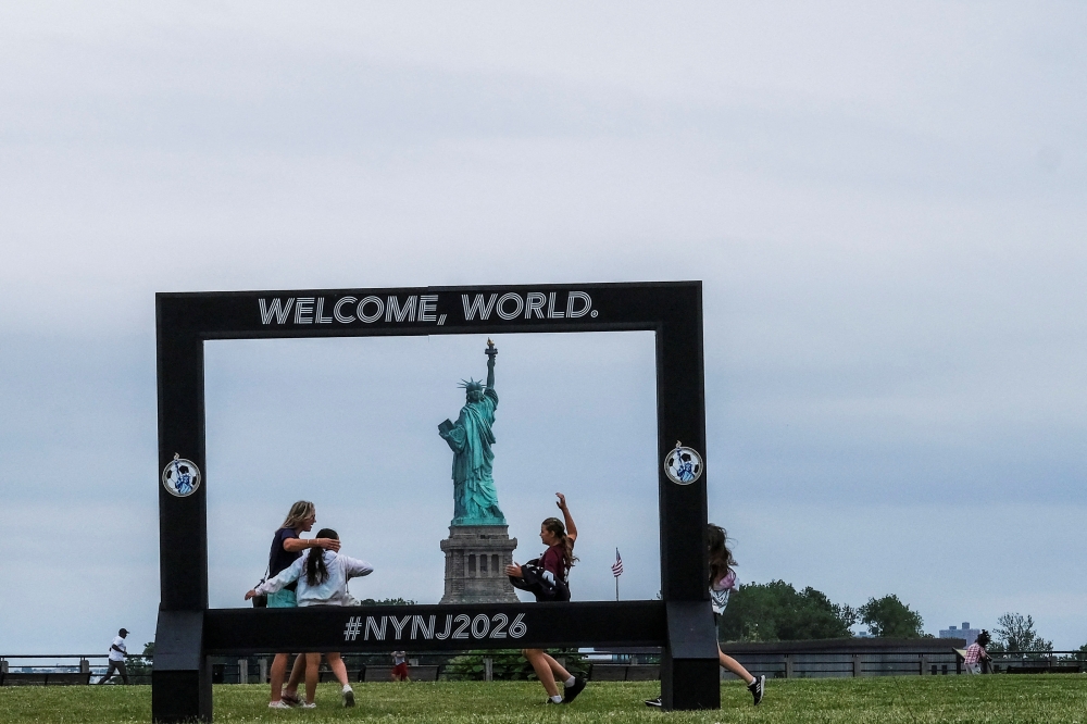 People attend the 2026 FIFA World Cup Host City Selection Watch Party at the Liberty State Park in Jersey City, New Jersey, U.S., June 16, 2022. REUTERS/Eduardo Munoz