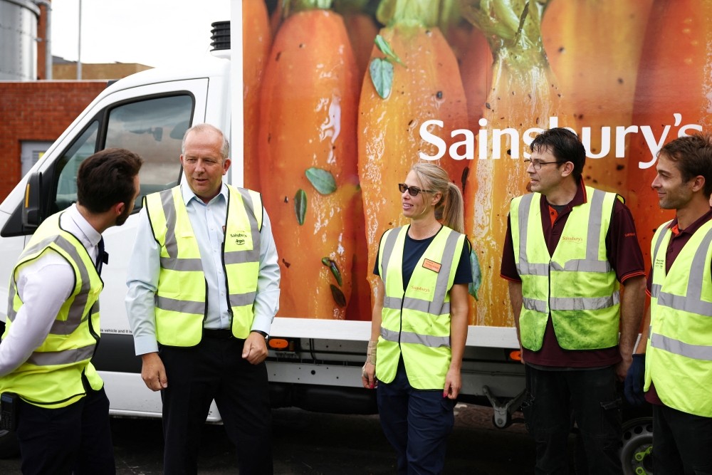 Chief Executive Officer of Sainsbury's Simon Roberts speaks to staff members at a Sainsbury’s supermarket in Richmond, west London, Britain, June 27, 2022. Reuters/Henry Nicholls