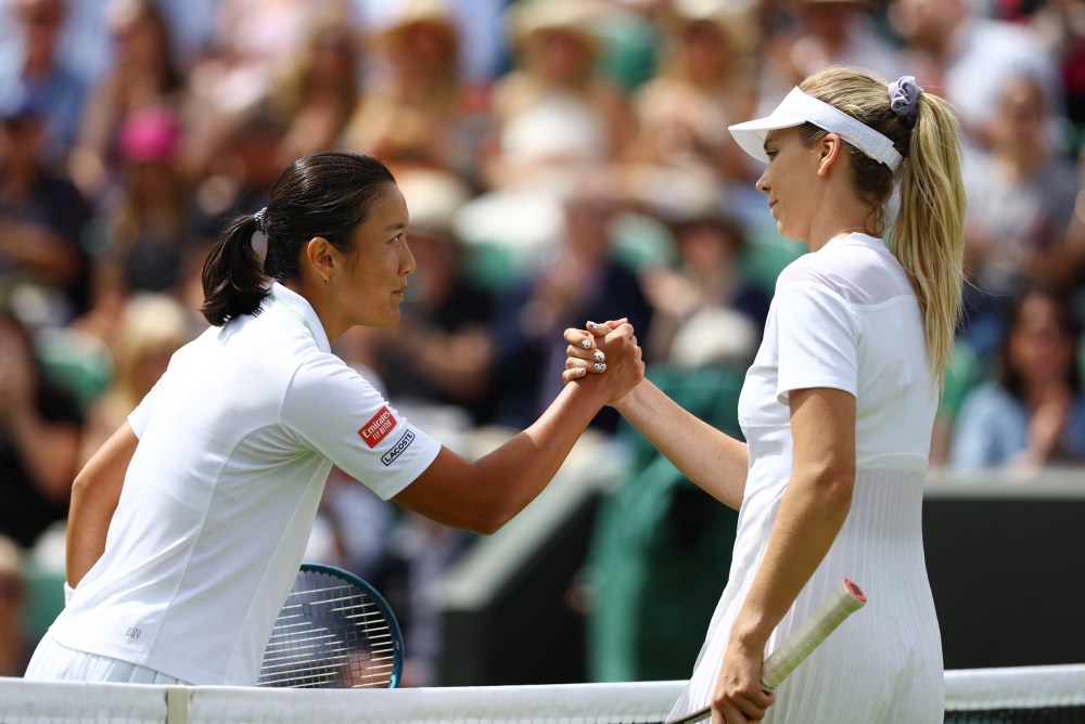 France's Harmony Tan shakes hands with Britain's Katie Boulter after winning their third round match REUTERS/Hannah Mckay