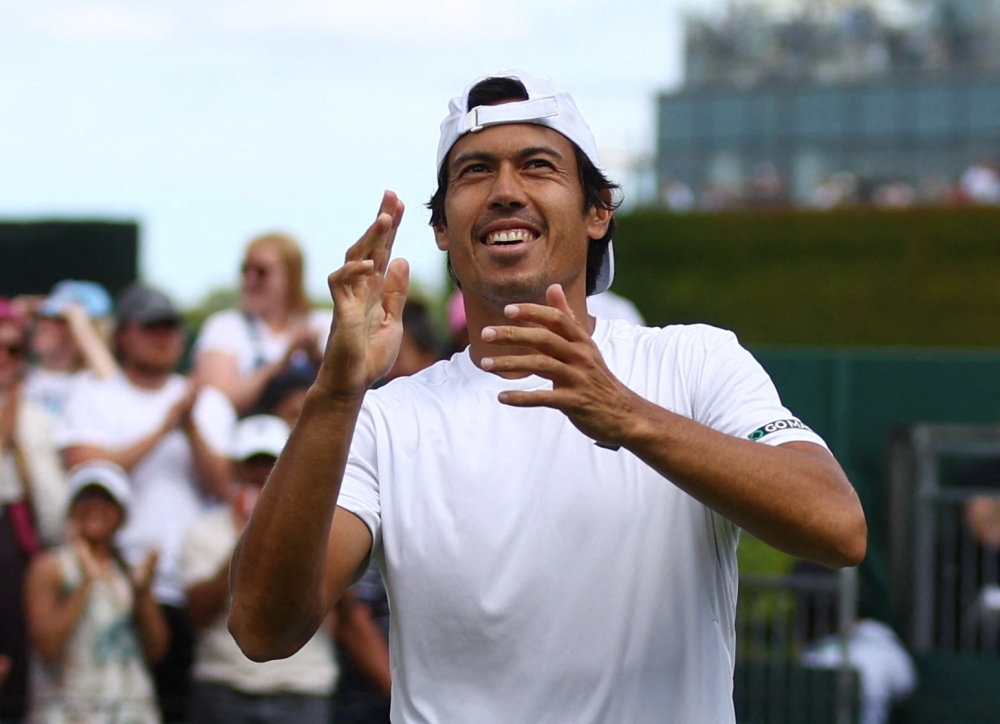July 2, 2022 Australia's Jason Kubler celebrates after winning his third round match against Jack Sock of the U.S. REUTERS/Hannah Mckay