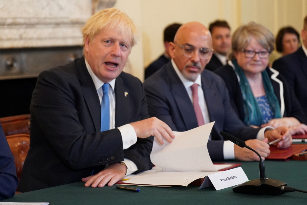 Prime Minister Boris Johnson, Chancellor of the Exchequer Nadhim Zahawi and Work and Pensions Secretary Therese Coffey attend a Cabinet meeting at 10 Downing Street, London, Britain, July 19, 2022. (Stefan Rousseau/Pool via REUTERS)