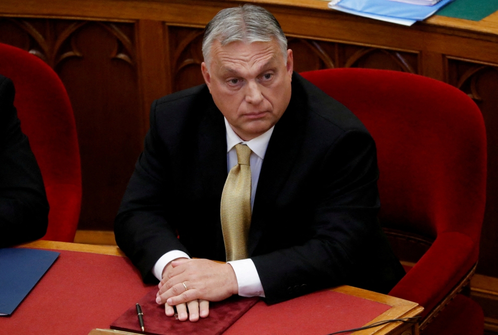 FILE PHOTO: Hungarian Prime Minister Viktor Orban sits before taking the oath of office in the Parliament in Budapest, Hungary, May 16, 2022. REUTERS/Bernadett Szabo/File Photo