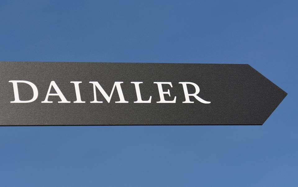 Daimler AG sign is pictured at the IAA truck show in Hanover, Germany, September 22, 2016. REUTERS/Fabian Bimmer/File Photo