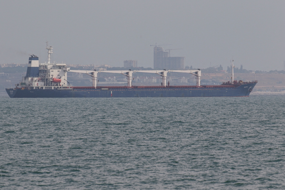 The Sierra Leone-flagged ship Razoni leaves the sea port in Odesa after restarting grain export, amid Russia's attack on Ukraine, on August 1, 2022. (REUTERS/Serhii Smolientsev)