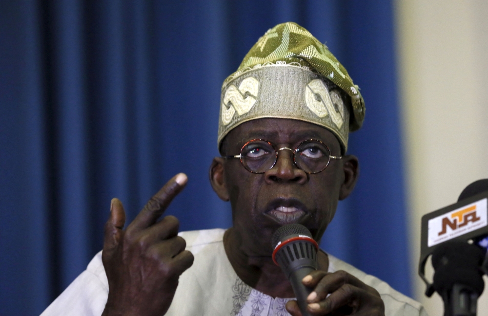 File Photo: Bola Tinubu, former Lagos state governor and All Progressives Congress (APC) leader, speaks at a party meeting in Abuja, Febuary 17, 2015. (REUTERS/Afolabi Sotunde)