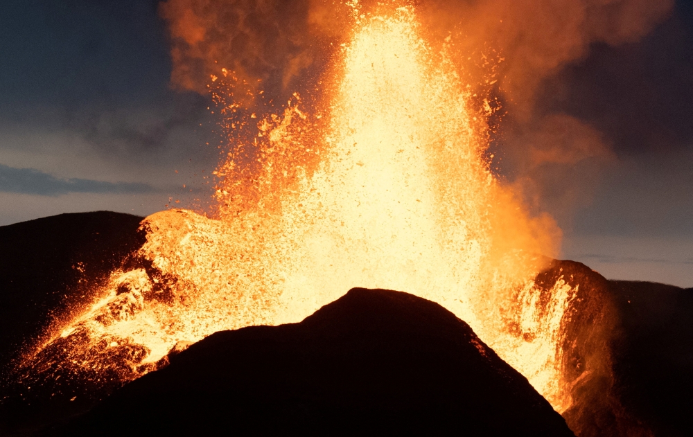 File Photo: Lava erupts from the Fagradalsfjall volcano on the Reykjanes Peninsula in southwestern Iceland on May 18, 2021. (Reuters)