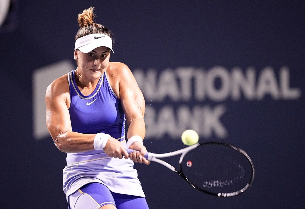 Bianca Andreescu (CAN) returns to Alize Cornet (not pictured) at Sobeys Stadium. Mandatory Credit: John E. Sokolowski-USA TODAY Sports